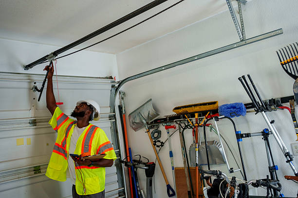 Professional Garage Door Panel Replacement technician working in New Castle, IN
